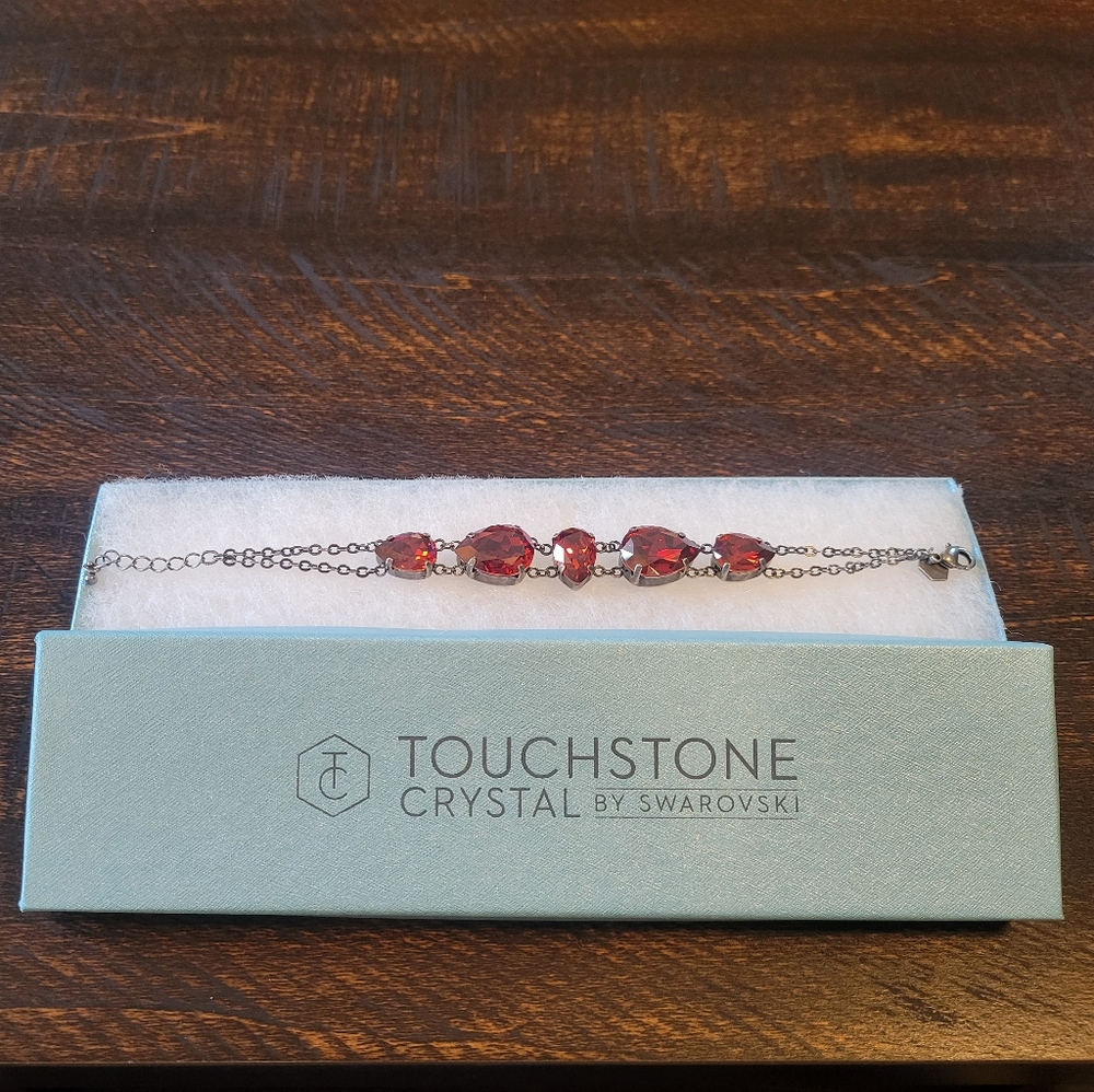 Touchstone Crystal Rhodium Plated Red Bracelet